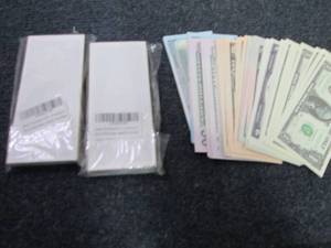 lot 118 image: 3 pks Prop Money...