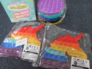 lot 135 image: Popit Toys...