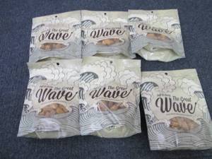 lot 234 image: 7- 4.5 oz The Great Wave Dog Treats...