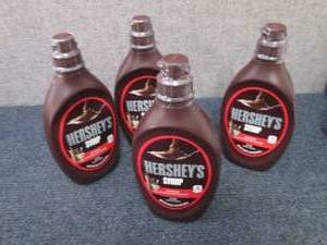 lot 265 image: 4- 24 oz Hersheys Syrup...