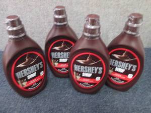 lot 266 image: 4- 24 oz Hersheys Syrup...