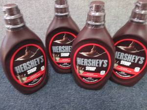 lot 267 image: 4- 24 oz Hersheys Syrup...