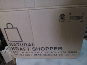 lot 324 image: Case of 250ct Uline Kraft Shopping ...