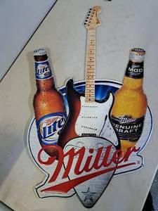lot 1350 image: Miller Lite  Miller Genuine Draft Beer Metal Sign
