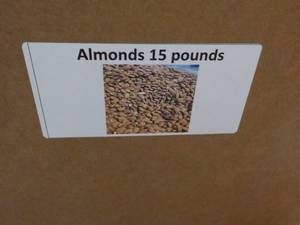 lot 327 image: 15 lb. Almonds...
