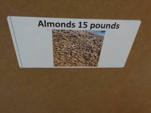 lot 328 image: 15 lb. Almonds...