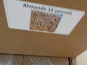 lot 329 image: 15 lb. Almonds...