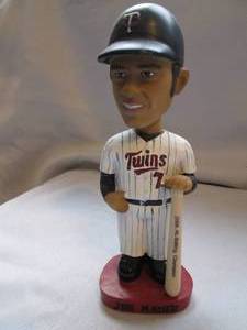 lot 555 image: Joe Mauer 7 bobblehead genuine han...