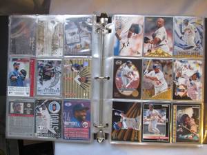 lot 603 image: Kirby Puckett binder full of cards...