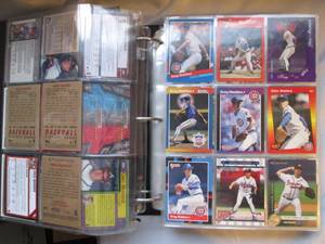 lot 607 image: Gregg Maddux large binder 75% full...