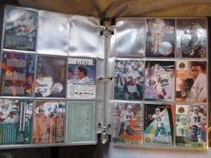 lot 611 image: Dan Marino binder 75% full...