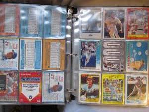 lot 612 image: Robin Yount binder 50% full...