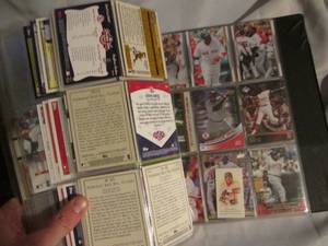 lot 628 image: David Ortiz binder 30% full...