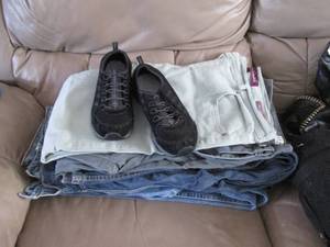 lot 304 image: Purses and ladies pants, mainly siz...