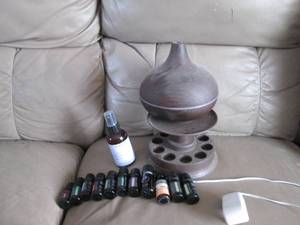 lot 309 image: Diffuser with a collection of oils ...