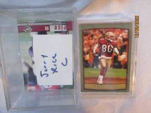 lot 670 image: Jerry Rice dual card cases...