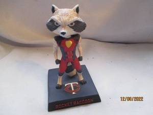 lot 692 image: Twins Rocket Racoon Bobble head...