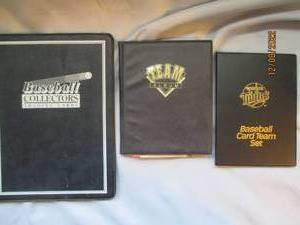 lot 699 image: Twins and Baseball heroes card book...