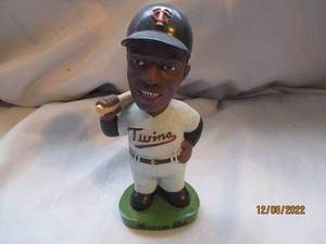lot 739 image: Oliva painted bobble head...