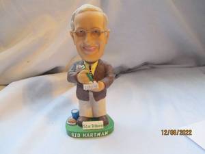 lot 748 image: Sid Hartman bobble head...