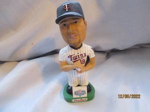 lot 750 image: Guadardo bobble head...