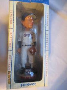 lot 766 image: Nolan Ryan bobble head in box...
