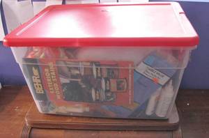 lot 12 image: Tote full of random craft supplies.
