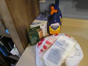 lot 387 image: Sanitizer lot. Two boxes of size la...