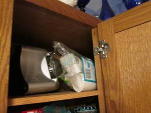 lot 389 image: Corner kitchen cupboard with a vari...