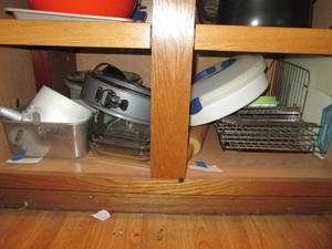 lot 403 image: Bottom of cupboard both sides. Bake...