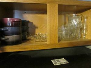 lot 406 image: Above the fridge cabinet of glasswa...