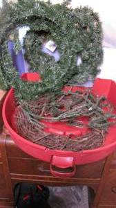 lot 49 image: Plastic wreath-storage container wi...