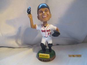 lot 777 image: Joe Mauer Rock Cats Bobble head...