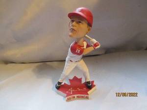 lot 780 image: Justin Morneau Team Canada Baseball...
