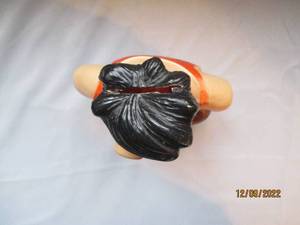 lot 799 image: Fred Flintsone toys and penny bank...