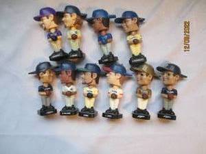 lot 812 image: Tiny Bobble head collection of Base...