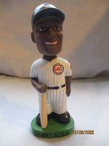 lot 830 image: Sammy Sosa Painted bobble head...