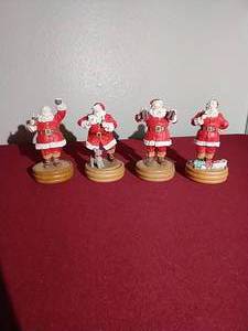 lot 13 image: (4) Coca-Cola Santa Figurines