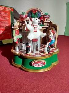 lot 17 image: Coca-Cola Christmas Musical Figurine