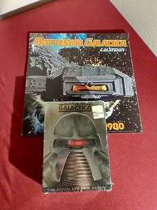 lot 75 image: Battlestar Galactica Lot - 1980 Calendar & Sealed DVD Set