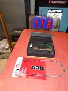 lot 116 image: Rechargeable flashlight & gripper. As shown.