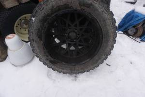 lot 8 image: Set of 4  Repulsor MT Rolling Big Power Truck Tires On 6 Bolt Vision Rocker Wheels