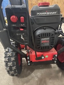 26 in. Two-Stage Electric Start Gas Snow Blower with Brigg Stratton Engine In good condition open box see pictures