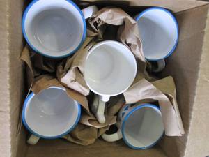 set of 4 holiday mugs and 1 foot ba...