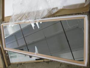 new mirror 64 inches x 21.5 inches...