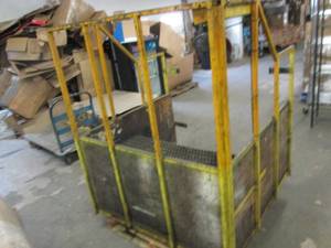 metal cage with lights for a forkli...