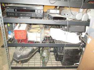 3 shelfs of electronics and 2 chain...