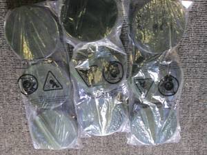 3 packs of three new hockey pucks...