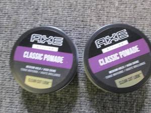 2 cans of axe classic pomade...
