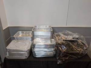 lot 56 image: Commercial Disposable Aluminum Foil Pans with Lids and Large Bag of Tongs